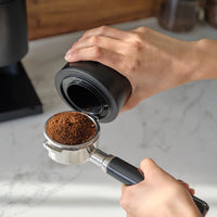 fellow opus specialty coffee grinder dosing espresso portafilter