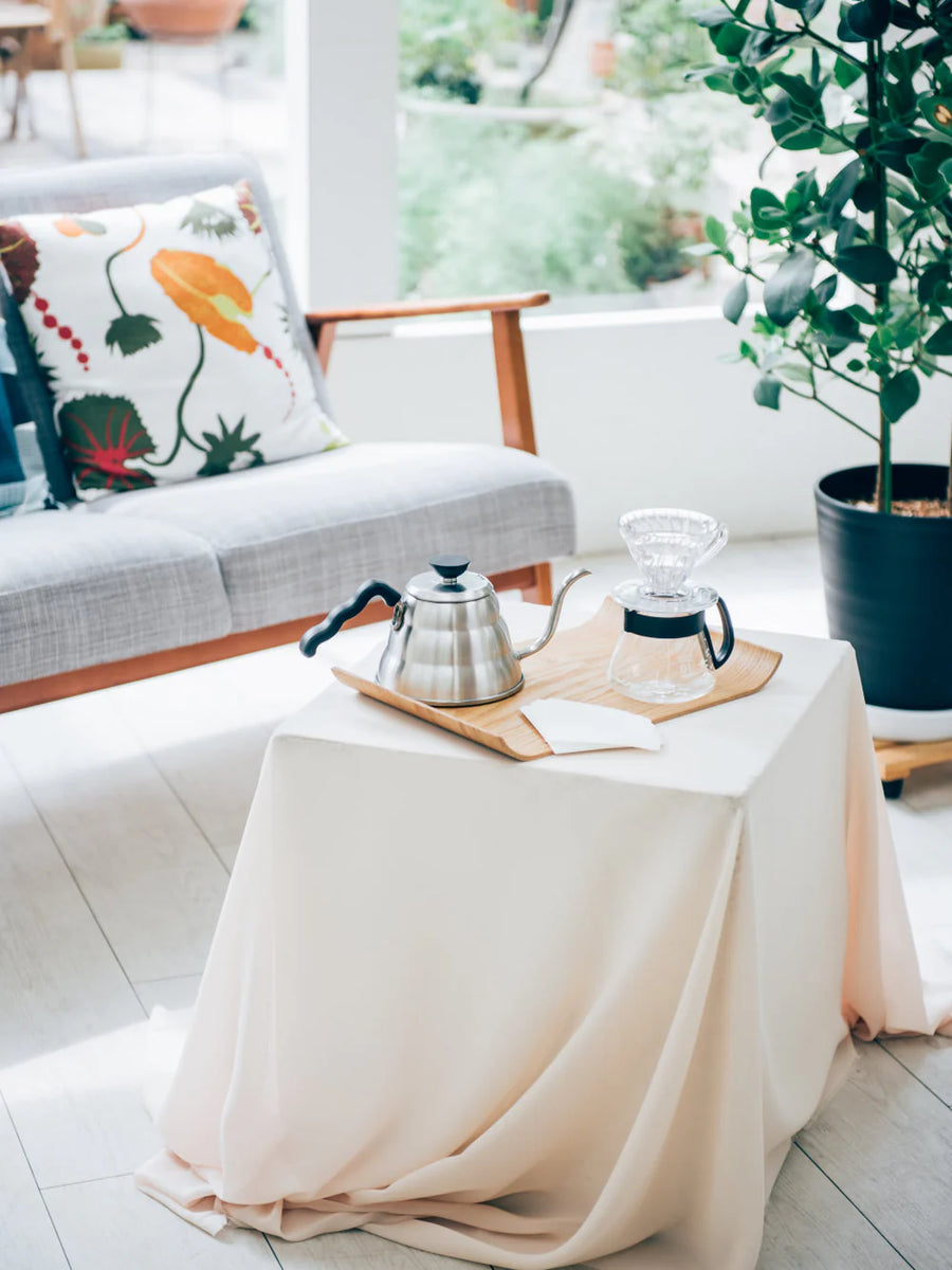 Hario V60 dripper and buono kettle specialty coffee brewing